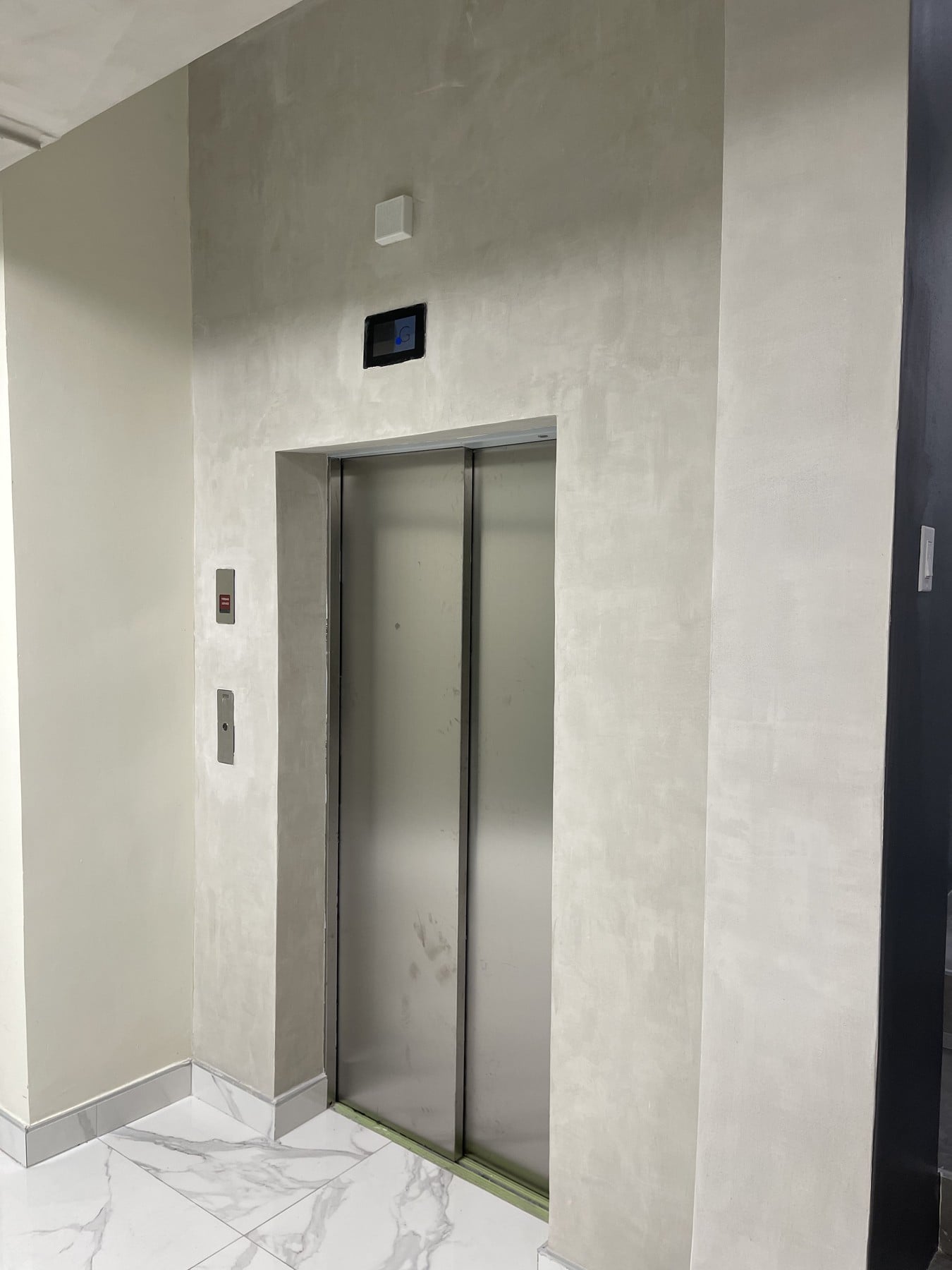 Custom Archi+ Lime plaster finish around the reception